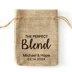 Personalized burlap drawstring favor bag printed with “The Perfect Blend,” names, and a date